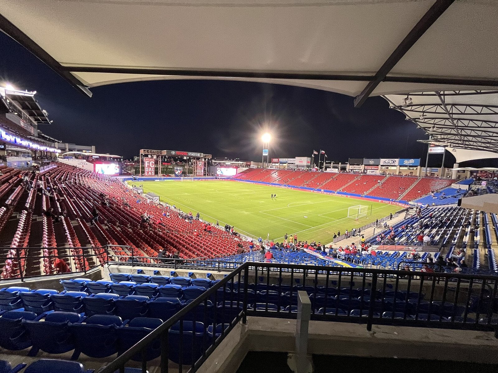 Toyota Stadium in Frisco, Texas lit up at night for a soccer match
