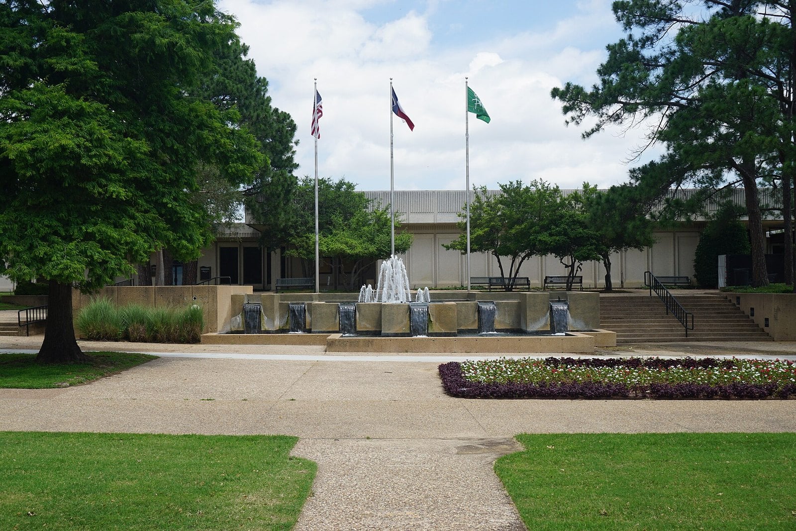 The fountain and flags outside Grand Prairie City Hall, Texas